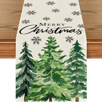 Chemin de Table en Tissu Motif de Noël sur une table en bois sur fond blanc