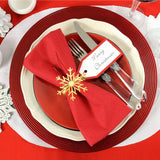 serviette rouge et rond de serviette doré