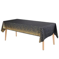 Nappe Jetable Noire Imperméable à Pois sur une table sur fond blanc