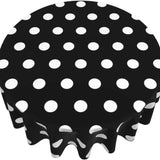 Nappe noire ronde design à pois blancs, sur un fond blanc.