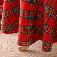 détail couture nappe à carreaux rouge 