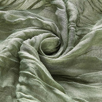 gros plan texture du chemin de table en gaze vert 